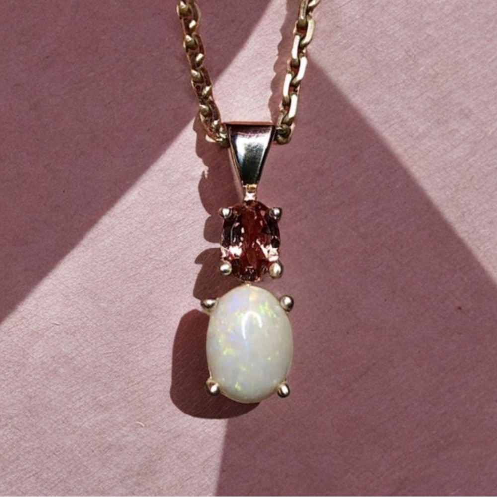 “The Aurora” White Australian Opal and pink spinel pendant. Handmade set in 925.